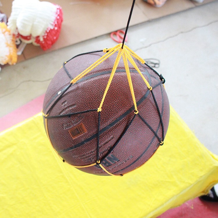Black and yellow hand pocket football basketball net bag